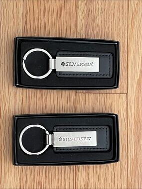 Silversea NEW Boxed Black Leather Keychains with Silver Metal Plate - Pair